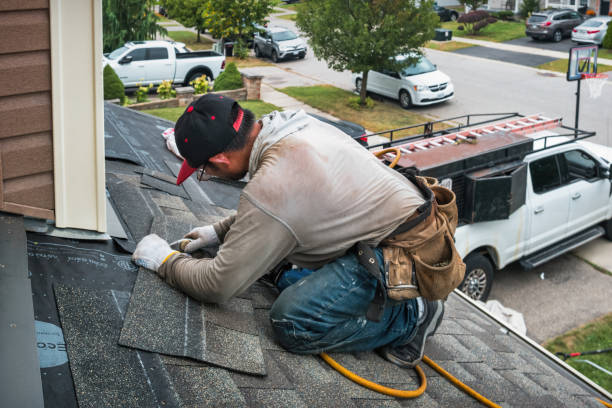 Professional Roofing technician working in Morrisonville, WI